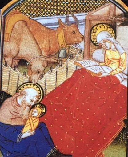 Maria legge e Giuseppe culla il bambino